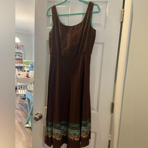 Brown with teal design at bottom hem